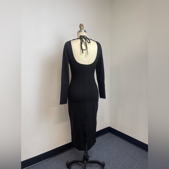 Fame & Partners Long Sleeve Tie Back Midi Dress Black
Bodycon - Picture 4 of 6